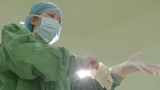 手术室戴手套剖腹产手术妇产科