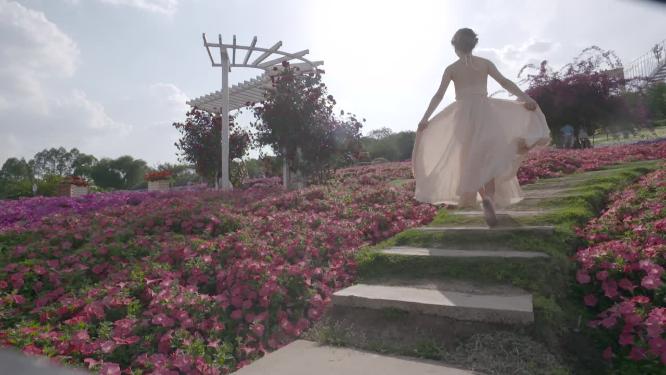 唯美美女在花海中跳舞春天鲜花盛开人比花娇