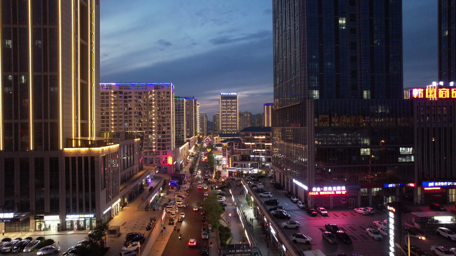航拍威海经区韩乐坊街区的建筑灯光夜景