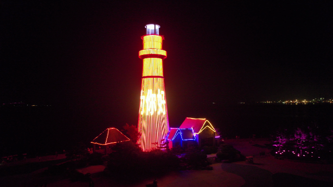航拍环绕威海悦海广场灯塔夜景