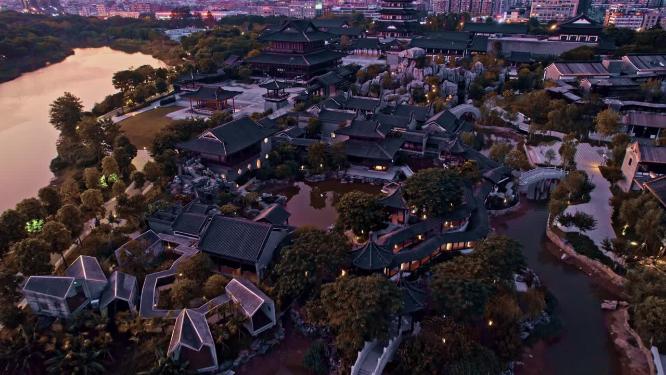 航拍夜幕降临的广州文化馆新馆（素灯夜景）
