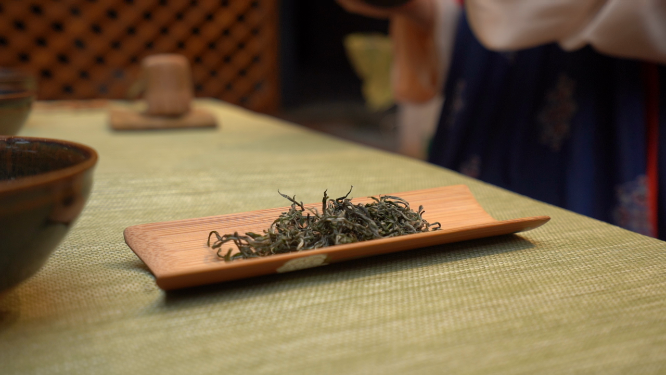 裙幄宴茶叶特写素材