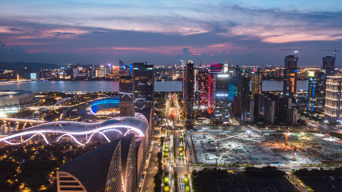 高速发展的杭州滨江夜景航拍延时