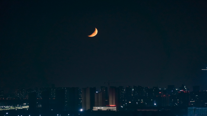 城市月亮落下延时摄影