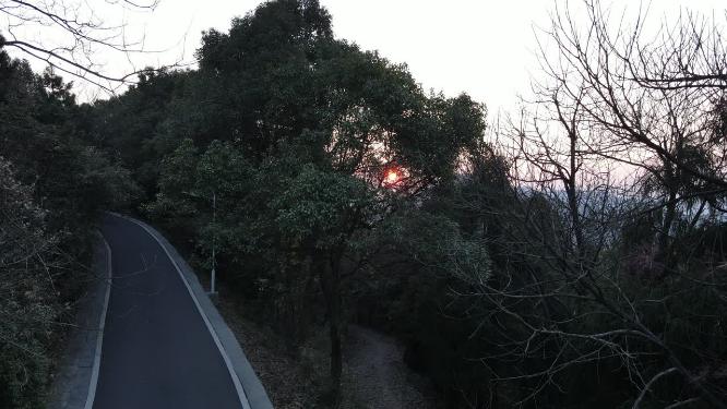 航拍连绵起伏山川日落晚霞