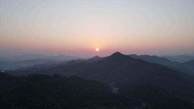 航拍连绵起伏山川日落晚霞