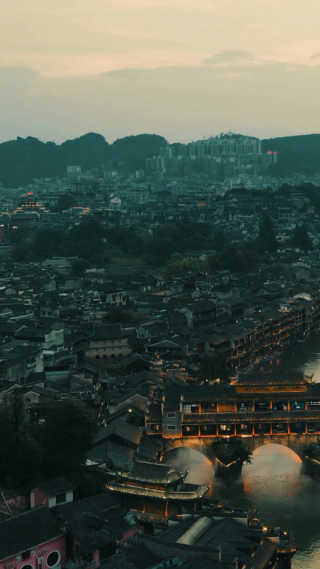 旅游景区湖南凤凰古城日落航拍延时