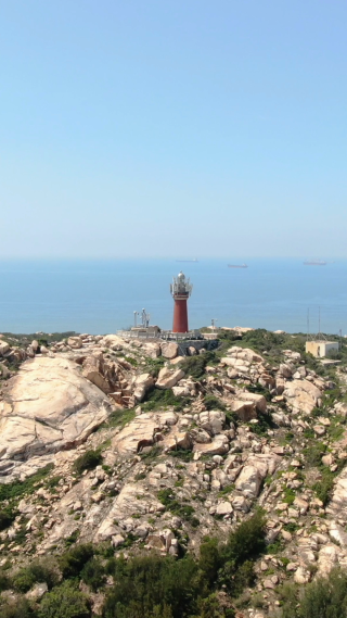 旅游景区福建湄洲岛灯塔竖屏航拍
