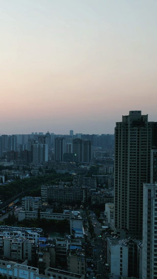 湖北襄阳城市日落晚霞夕阳竖屏航拍 