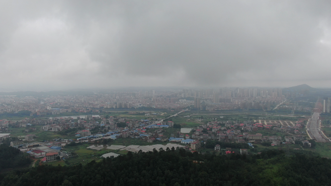 航拍城市暴雨来临雨季