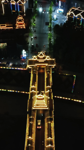 侗族特色建筑风雨桥鼓楼夜景竖屏