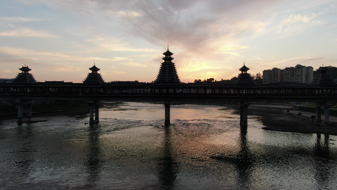 侗族风雨桥日落晚霞夕阳航拍