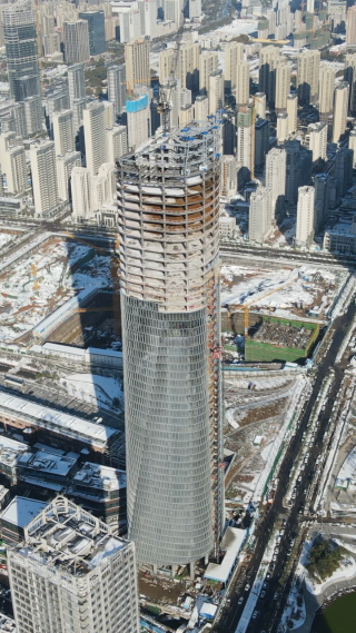 城市航拍在建商务大楼竖屏 