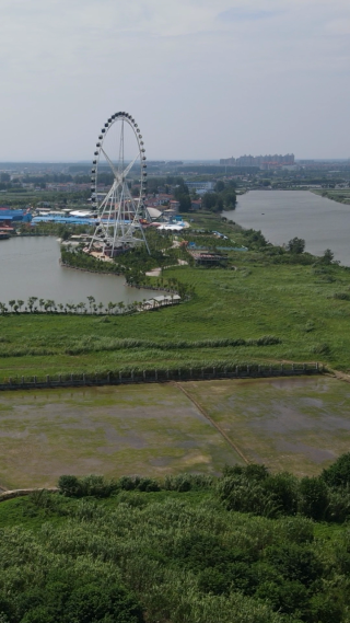 旅游景区湖南岳阳洞庭湖游乐场竖屏航拍