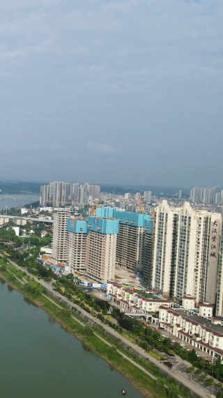 湖南益阳资江两岸高楼建筑竖屏航拍