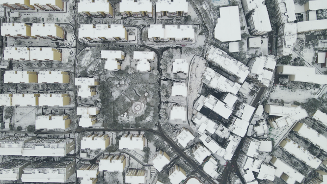 航拍住宅小区冬天雪景