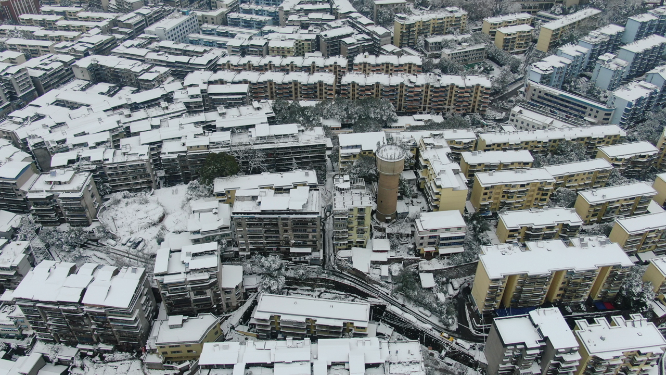 航拍城市住宅小区冬天雪景