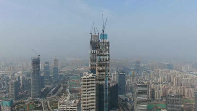 航拍山东济南在建CBD吊塔高楼