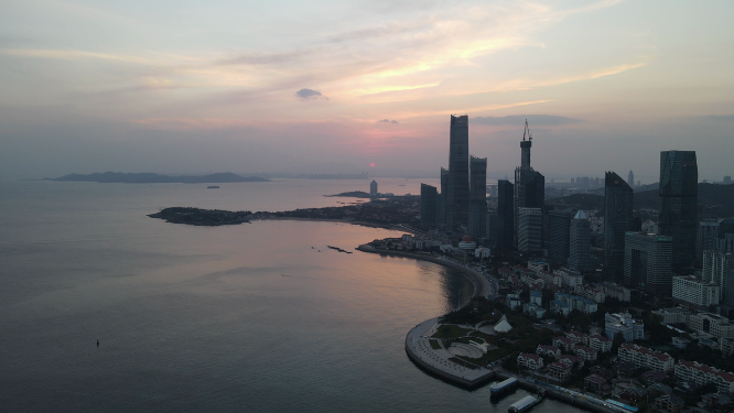 航拍山东青岛城市海边日落