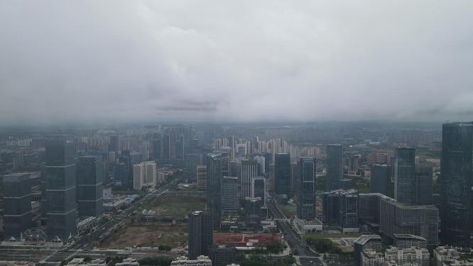 航拍夏季城市暴雨多变天气