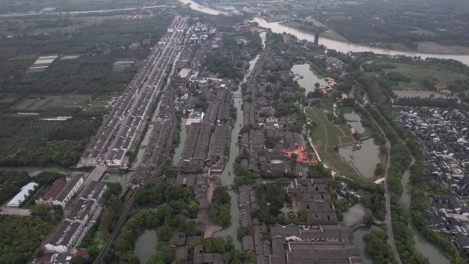 浙江嘉兴乌镇古建筑乌篷船划船航拍视频
