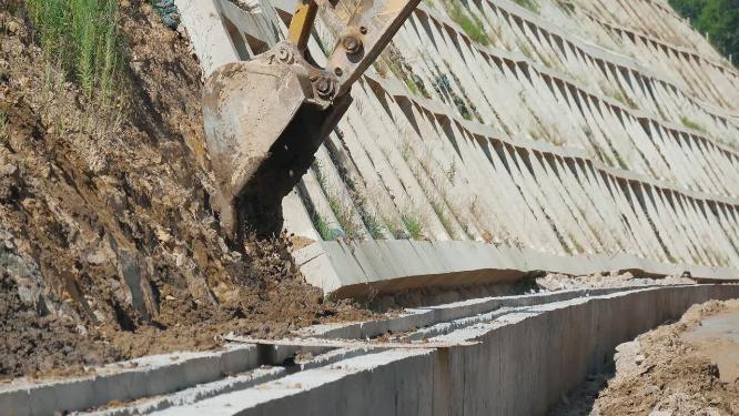 挖机公路建设施工场地挖机特写