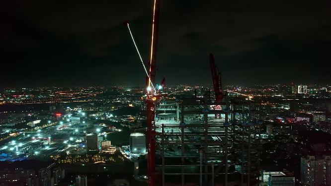 夜景航拍都市CBD金银双色城市吊塔