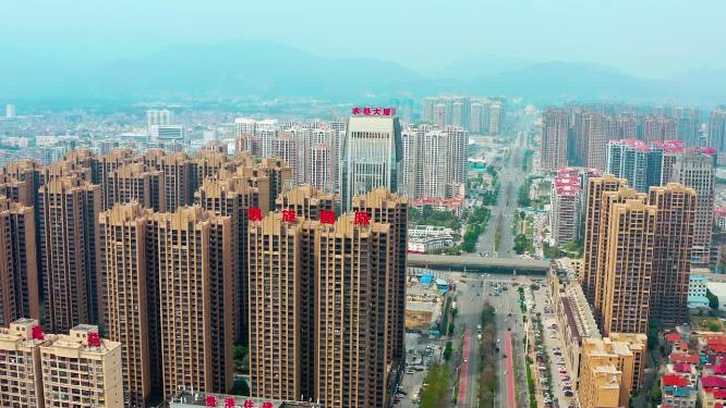 4k航拍广西贵港航拍农垦大厦大道