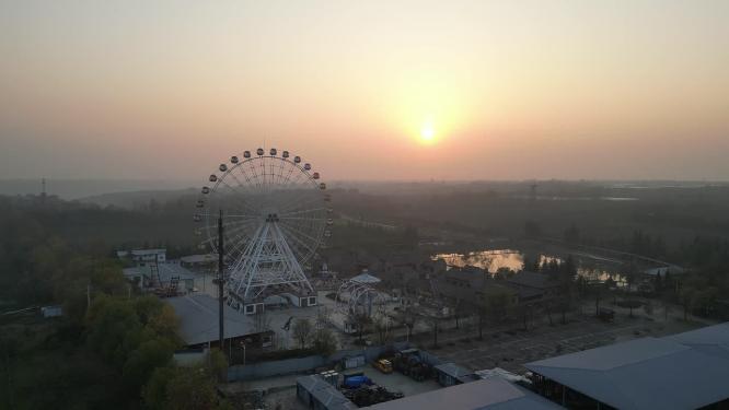 夕阳景区摩天轮秦风欢乐谷游乐场玩乐航拍
