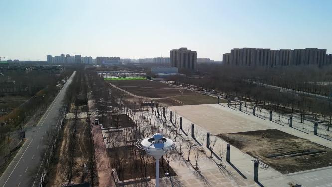 4K航拍北方冬天乡镇公园景观