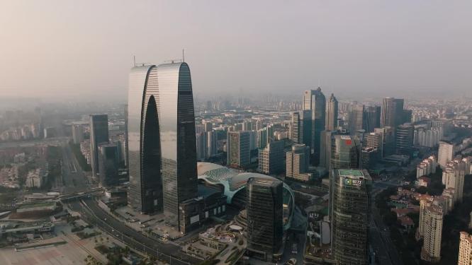 航拍日出时的苏州地标建筑东方之门