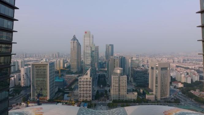 航拍日出时的苏州地标建筑东方之门