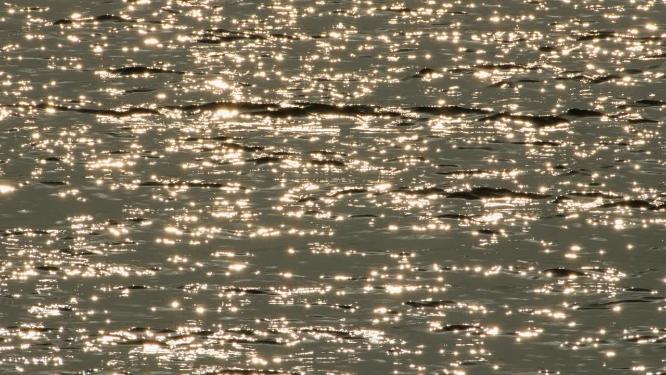 海水面波光粼粼浪花星芒