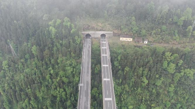 航拍公路高架桥穿山隧道