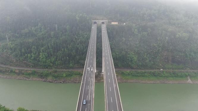 航拍公路高架桥穿山隧道