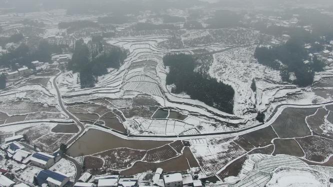 航拍冬天山区农田雪景