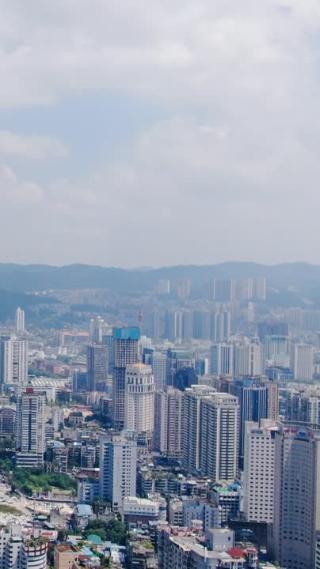 贵阳城市蓝天白云竖屏航拍