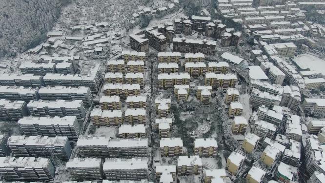 航拍城市住宅小区冬天雪景