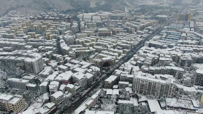 航拍城市住宅小区冬天雪景
