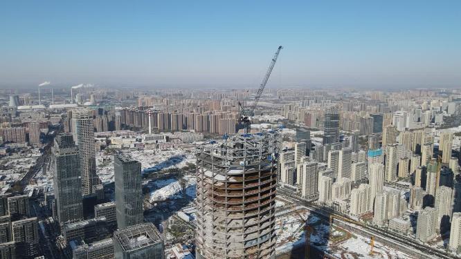 航拍济南金融中心CBD在建高楼吊塔