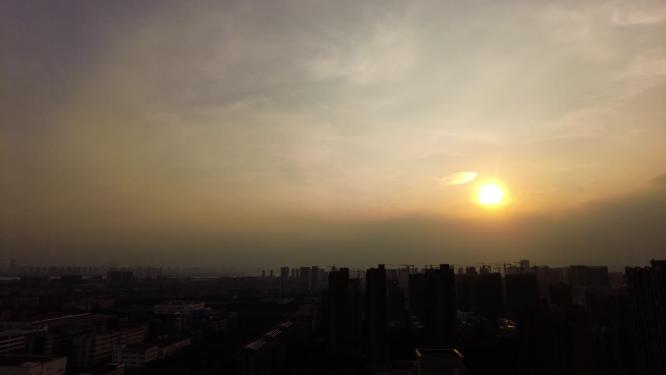 城市傍晚日落太阳下山延时摄影视频素材
