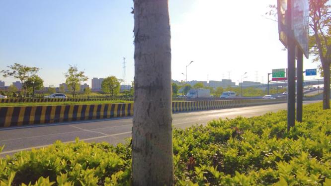 城市夕阳西下马路汽车车辆车流延时