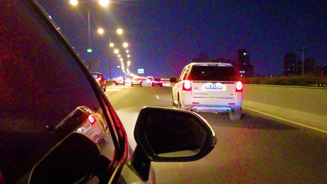 城市夜晚汽车在马路行驶夜景视频素材404