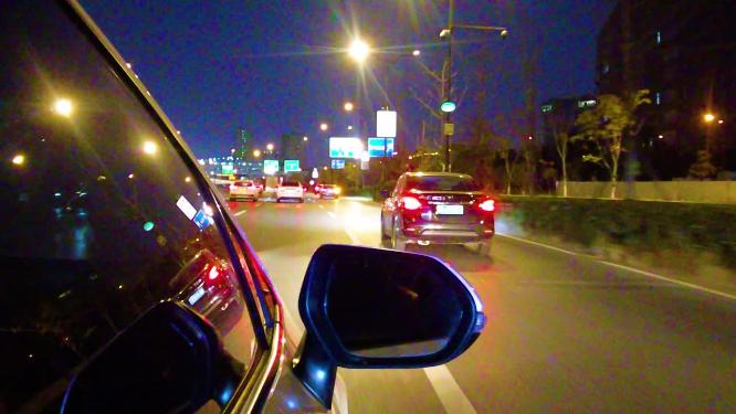 城市夜晚汽车在马路行驶夜景视频素材 