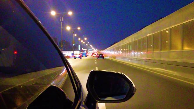城市夜晚汽车在马路行驶夜景视频素材