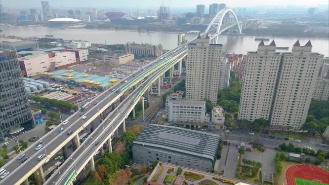 上海市黄浦江卢浦大桥车流船只延时风景视频素材