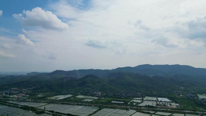 航拍浙江莫干山脚下大片水稻田以及乡村建设