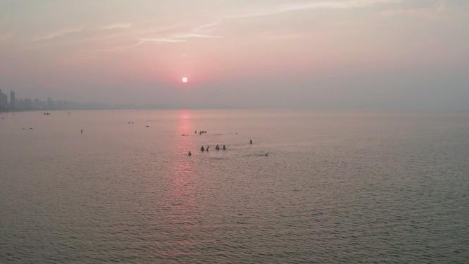 4k航拍山东烟台经济开发区金沙滩日落