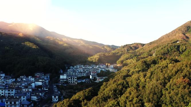黄昏唯美山间村庄光影航拍