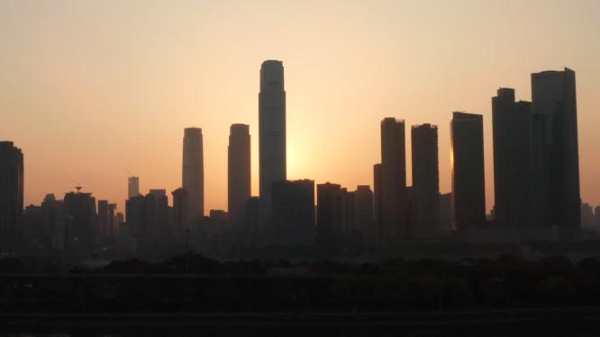 长沙国金中心CBD清晨唯美日出逆光航拍